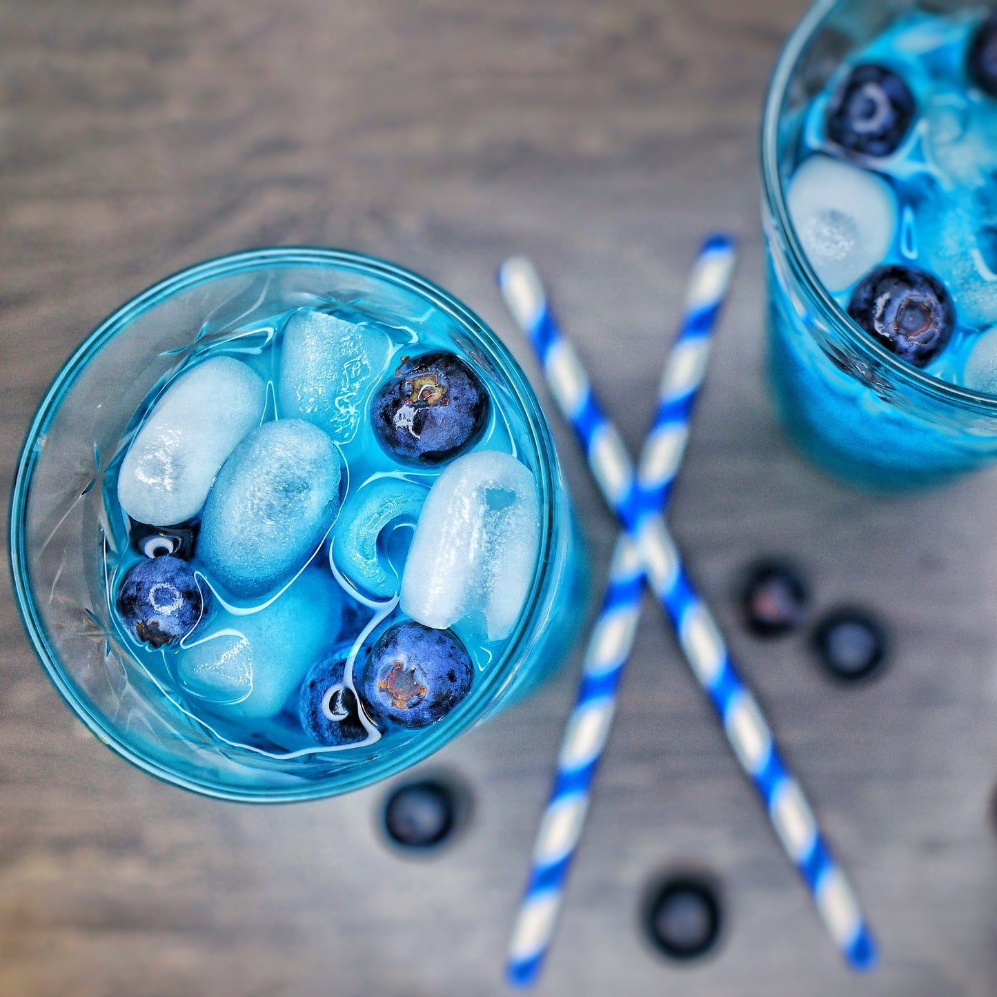 Delicious Blue Panther drink from Soft Rockz in glass decorated with blueberries