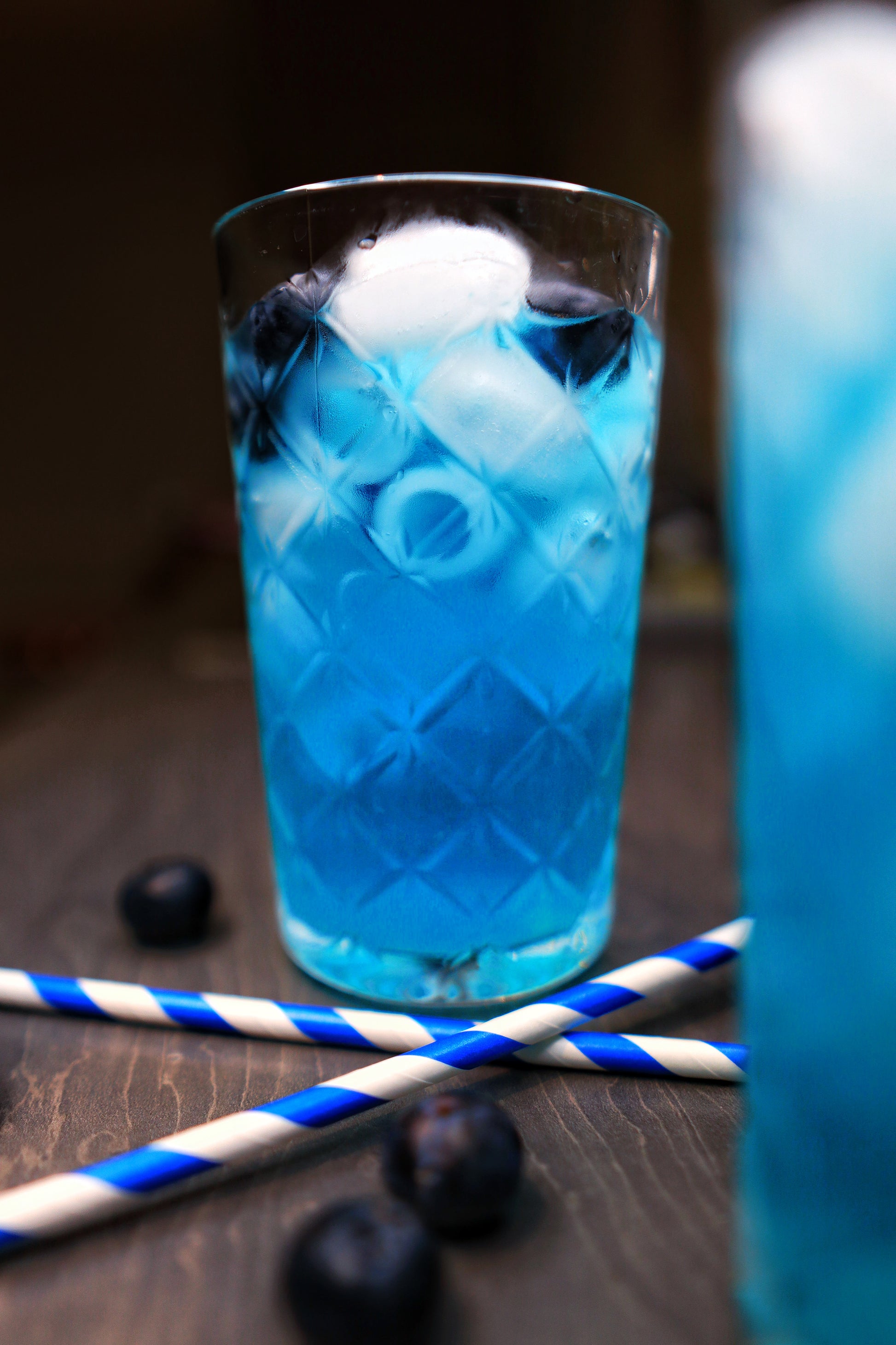 Delicious Blue Panther drink from Soft Rockz in glass decorated with blueberries