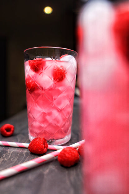 Delicious Pink Panther drink from Soft Rockz in glass decorated with Raspberry
