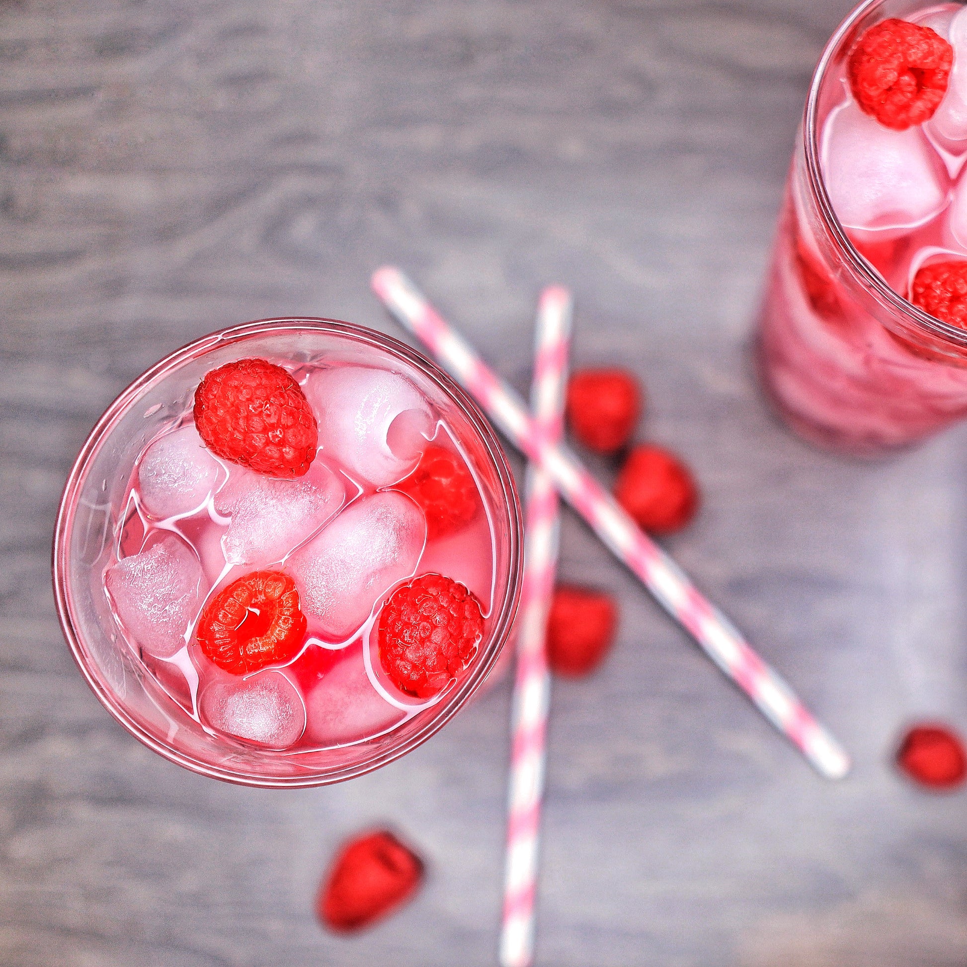 Delicious Pink Panther drink from Soft Rockz in glass decorated with Raspberry